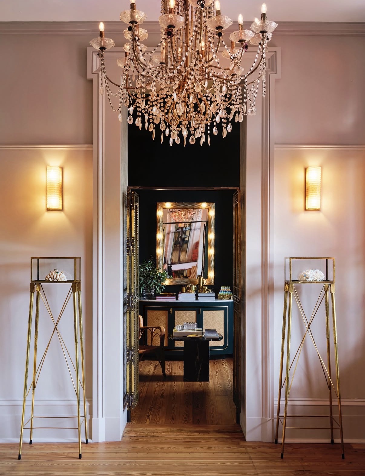 Crystal chandelier above a doorway in the hotel